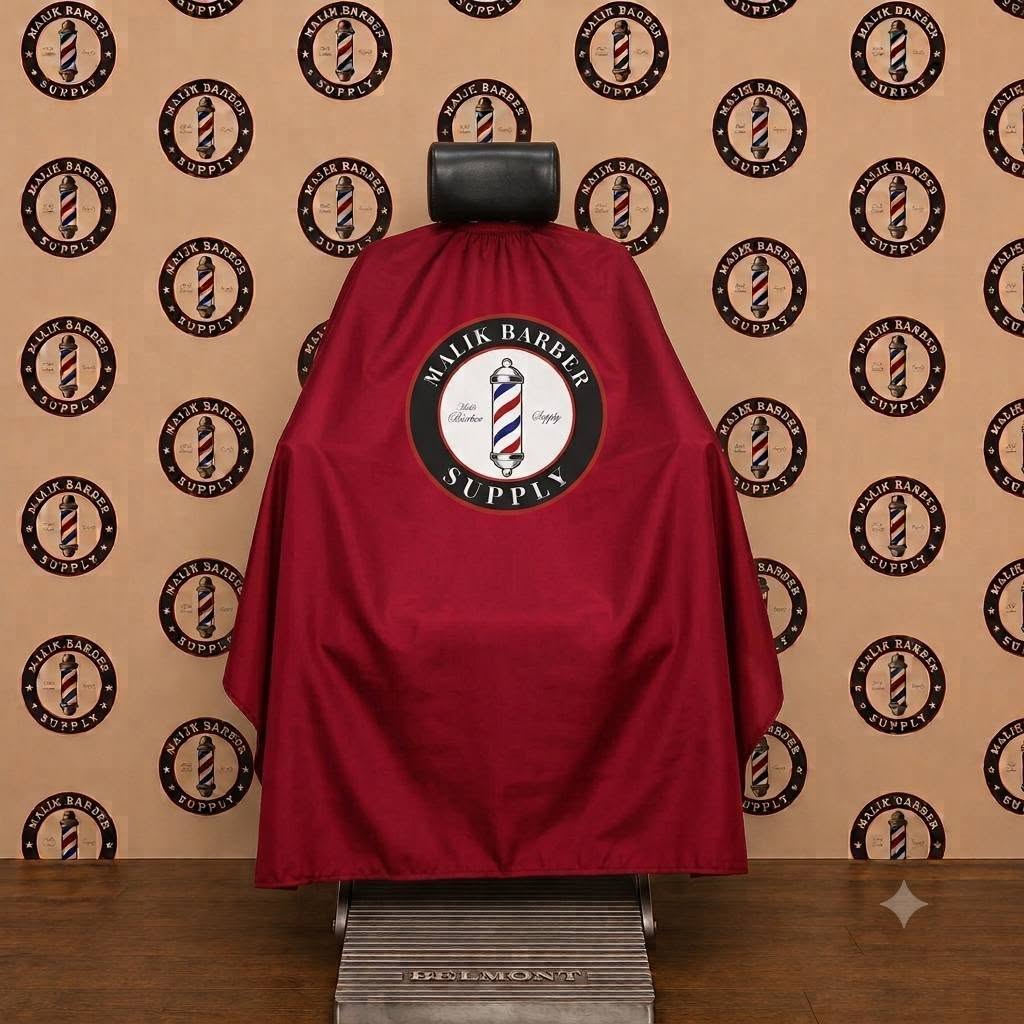 Premium Barber Cape – Custom Logo Hair Cutting Cape | Malik Barber Supply Professional barber cape with a custom logo printing area displayed on a barber chair.