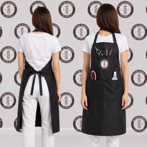 Professional barber apron with adjustable straps and multiple tool pockets
