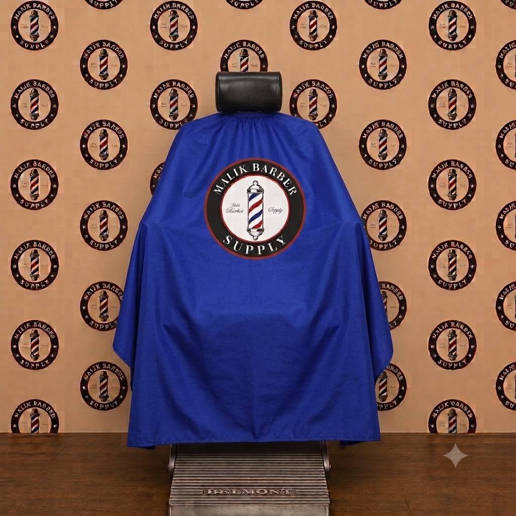 Barber Capes with Custom logos Professional barber cape with a custom logo printing area displayed on a barber chair.