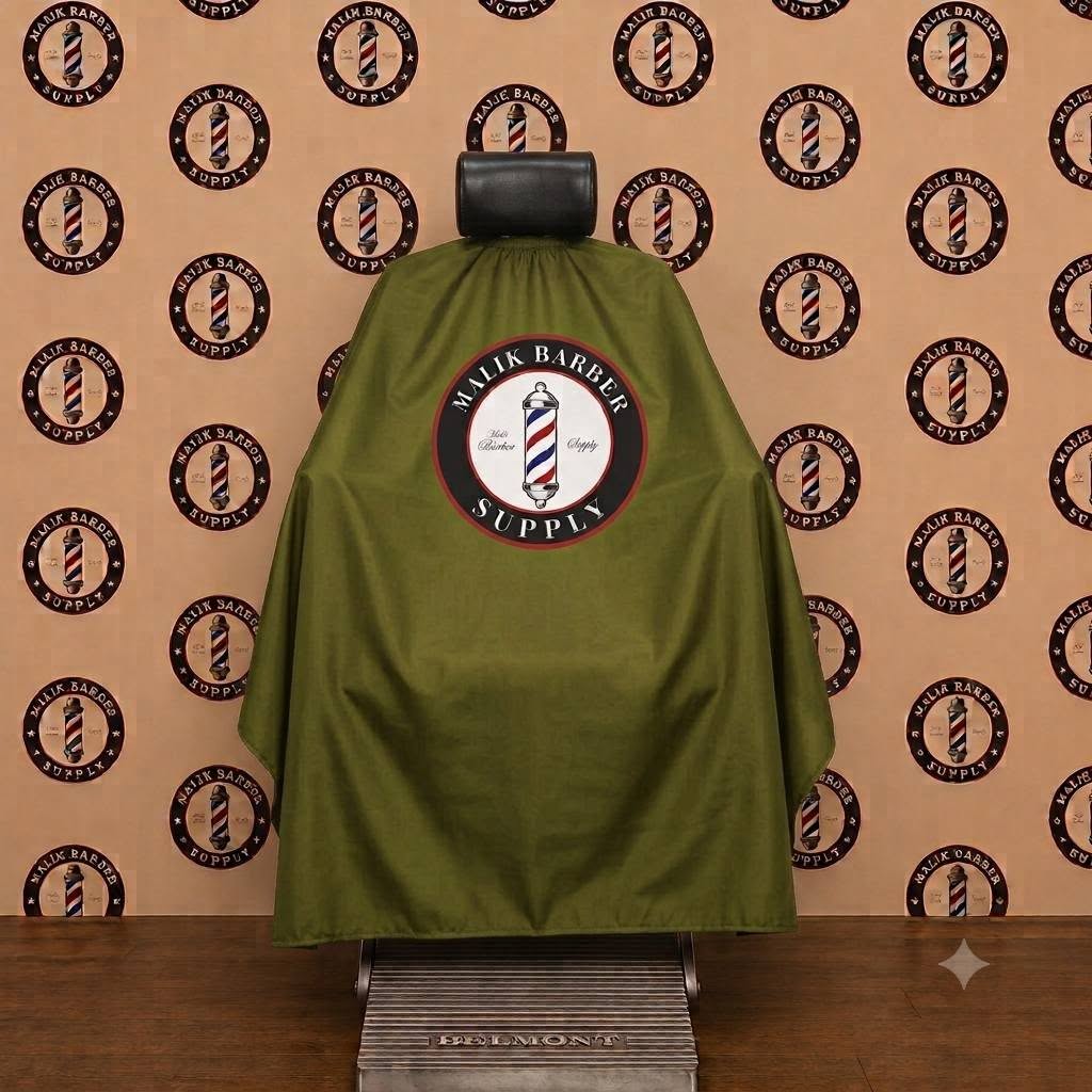 Premium Barber Cape – Custom Logo Hair Cutting Cape | Malik Barber Supply Professional barber cape with a custom logo printing area displayed on a barber chair.